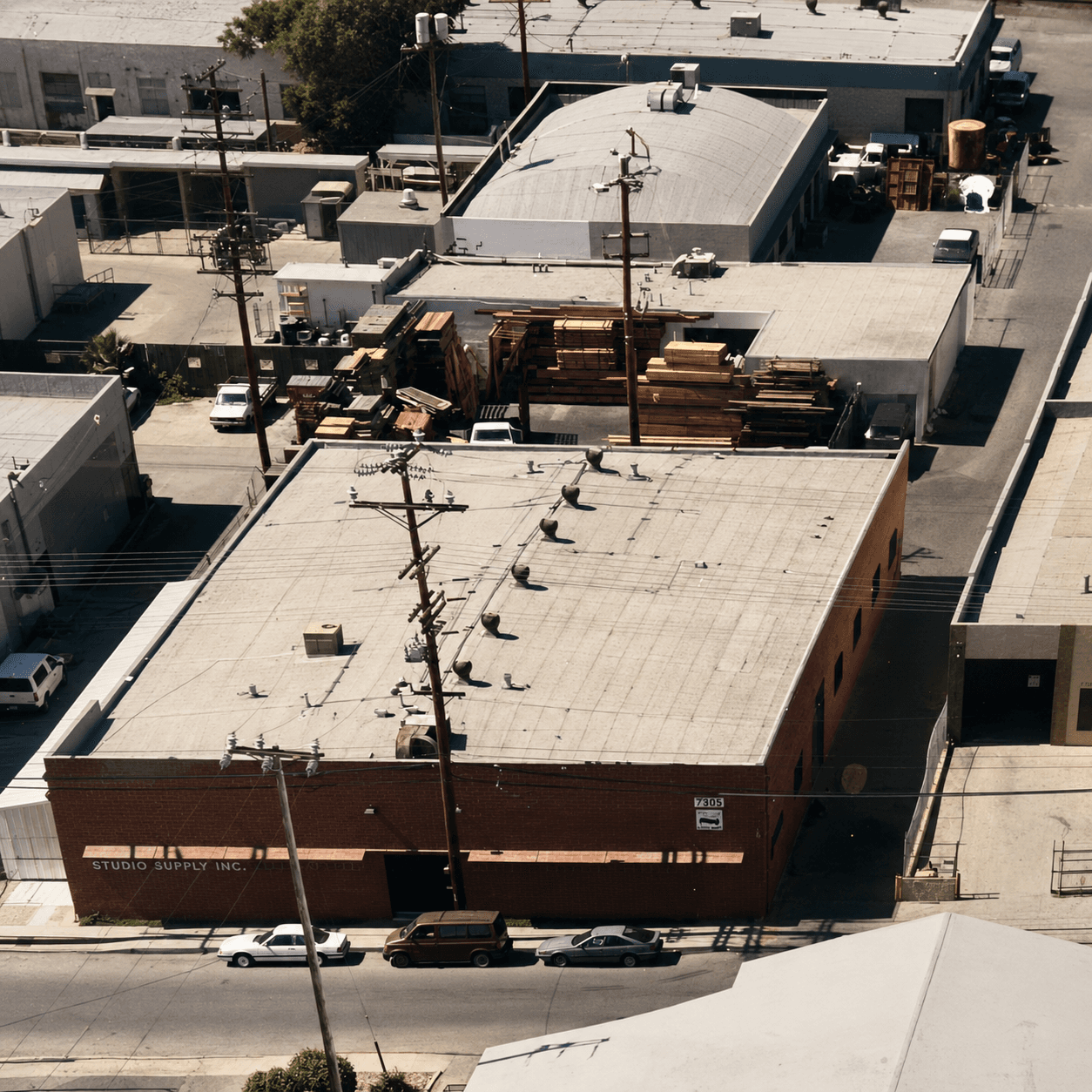 Aerial view of the Studio Supply & Recycling yard and warehouse at 7305 Ethel Ave, North Hollywood